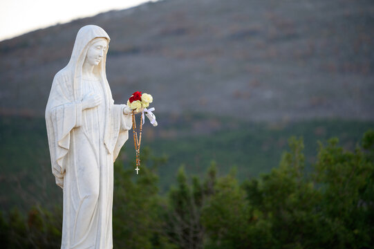 Statue of the Blessed Virgin Mary on Mount Podbrdo, the Apparition Hill overlooking the village of Medjugorje, Bosnia and Herzegovina.