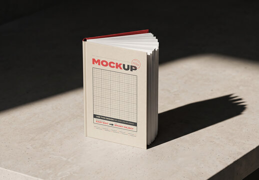 Hardcover Book on Stone Cover Mockup
