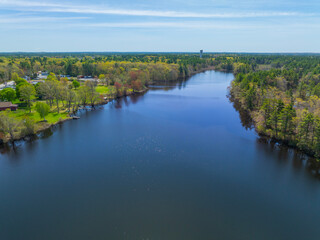 Fototapeta premium Norton Reservoir aerial view in spring in town of Norton, Bristol County, Massachusetts MA, USA. 
