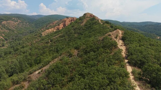 Aerial view of green forest around the Stob Pyramids, Bulgaria
