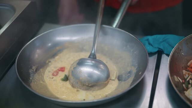 Sauce vegetables being stir fried in a pan, showcasing a colorful and vibrant culinary process, slow motion