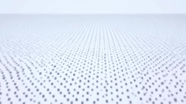 Dark gray dot field ripples in smooth wave patterns across bright white surface, forming flowing rows that recede toward soft horizon in minimal low-angle abstract composition