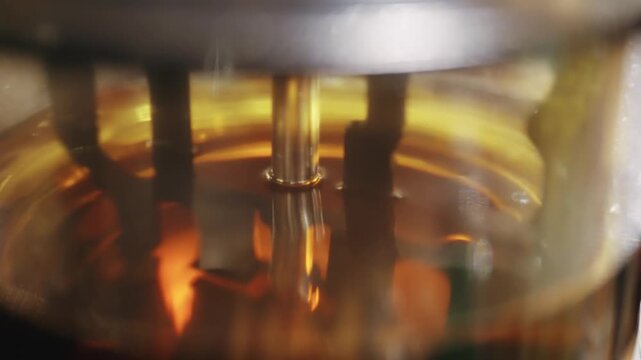 Liquid mixing science process with vibrant colors and intricate reflections