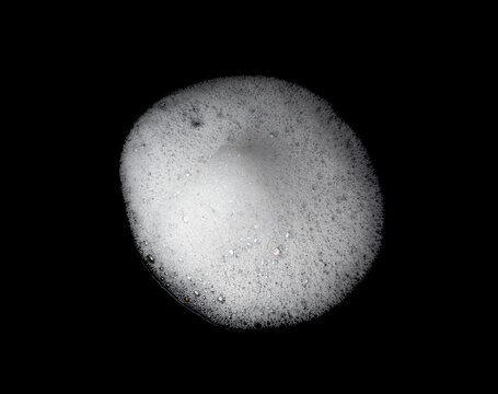 Soap foam on black background