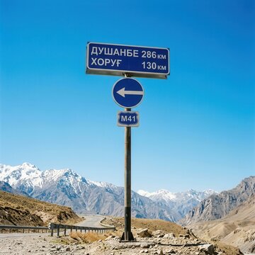 Mountain Road Signage In Tajikistan Indicating Distances To Dushanbe And Khorog