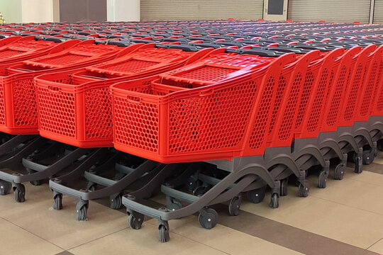 Red Shopping Carts Nested in Retail Store