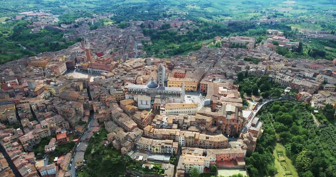 Amazing aerial panorama of historic city of Siena, nestled in the breathtaking Tuscan landscape of Italy