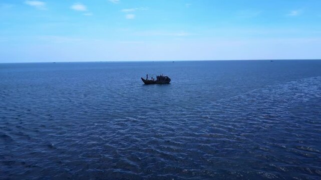Lone Fisherboat in the Open Sea: 4K Drone Footage off Phu Quoc Island, Vietnam