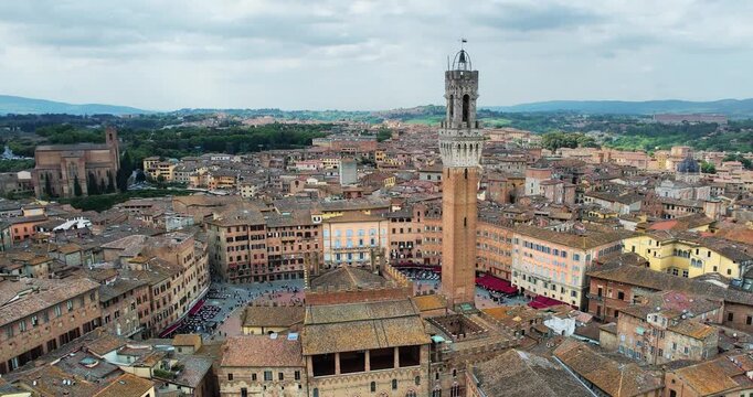Aerial View of Piazza Del Campo with tower Torre di Mangia in Siena, Tuscany, Italy