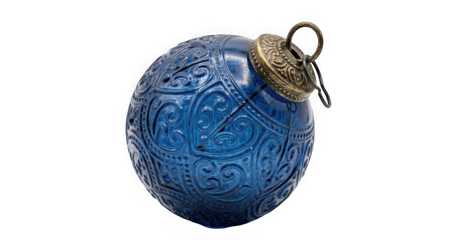 Blue glass christmas ornament with intricate embossed pattern and vintage metal cap isolated on transparent background