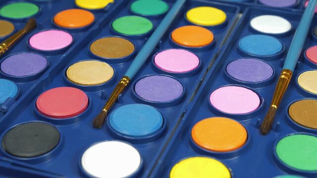 Watercolor paints and palette for creative painting projects and artistic work
