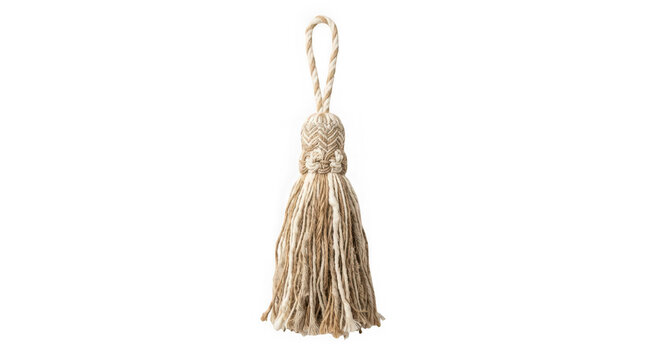 Decorative fabric tassel with a braided loop and textured fringe isolated on transparent background