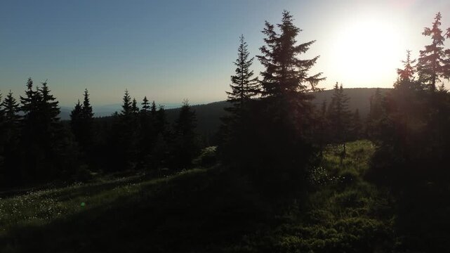 Aerial view of Voseck&aacute; bouda mountain shelter bathed in golden hour light, Karkonosze Mountains