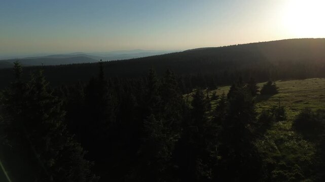 Aerial view of Voseck&aacute; bouda mountain shelter bathed in golden hour light, Karkonosze Mountains