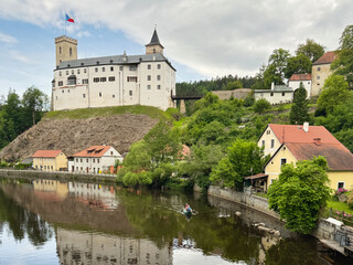 The castle on the hill along the river in Rozmberk nad Vltavou, Czechia © bleung