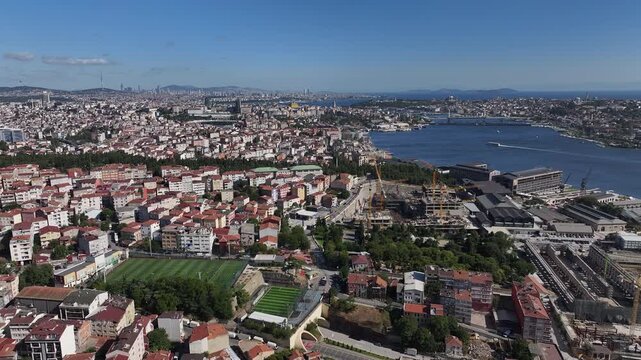 Breathtaking Aerial View of the Golden Horn in Istanbul. A stunning drone shot showcasing the historical Golden Horn (Halic) estuary in Istanbul, Turkey. The image captures the iconic bridges.