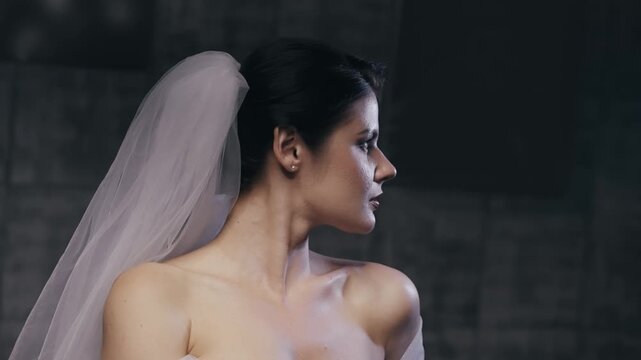 Stunning elegant bride portrait captured in a profile view, highlighting her grace and charm