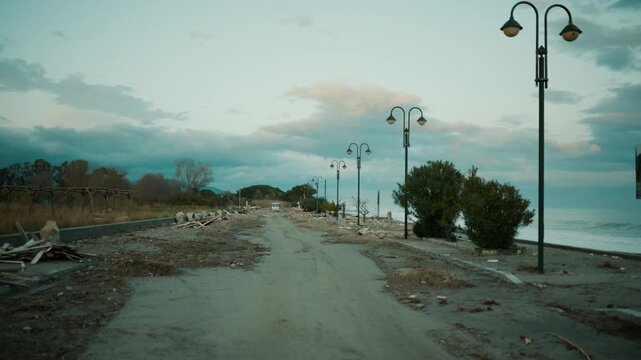 Seafront devastated by storm surge that brought sand and debris climate changes