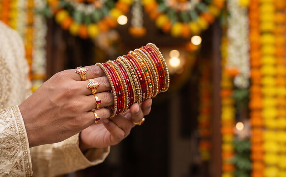Indian wedding rituals with traditional red and gold bangles and rings