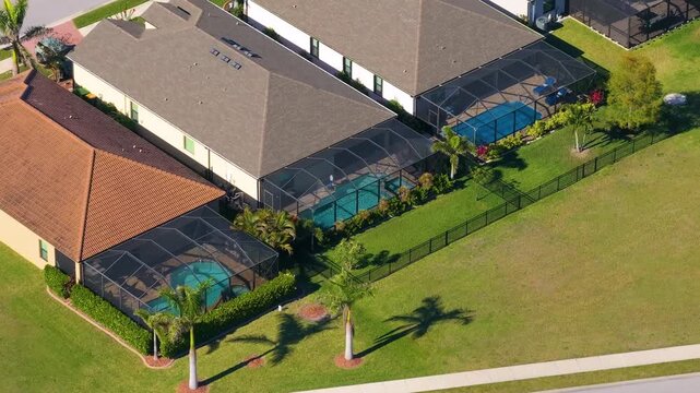 Wealthy residential area in USA suburbs. Rich neighborhood with expensive suburban homes in southwest Florida.
