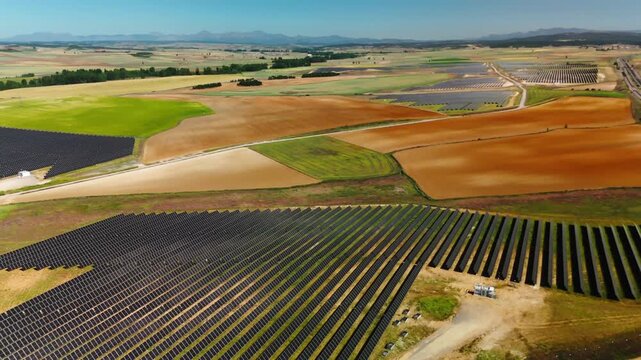 Solar parks across agricultural valley near Avila Spain