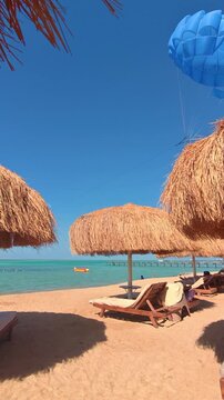 Tropical parasailing adventure over clear blue ocean waters.Egypt. Hurghada.
