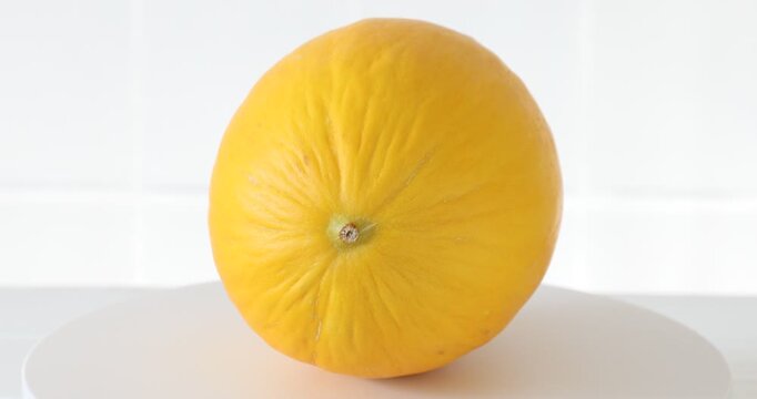 One fresh sweet melon on table, closeup
