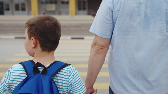 cross road zebra crossing, child crosswalk, Happy child with backpack, school day excitement, parental guidance, father-son relationship, smiling kid, making memories, safe crossing, school entrance