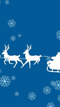 Animation of falling snow over santa claus in sleigh with reindeer