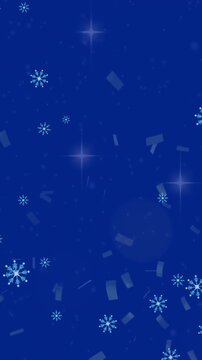 Animation of snowflakes and confetti falling over spots of light on blue background with copy space