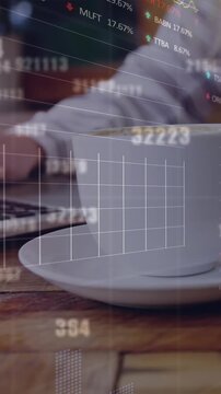 Animation of stock market data processing over mid section of a woman using laptop at a cafe