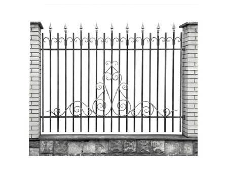Decorative wrought iron fence with elegant scrollwork and ornate spearhead finials, framed by stone clad columns.