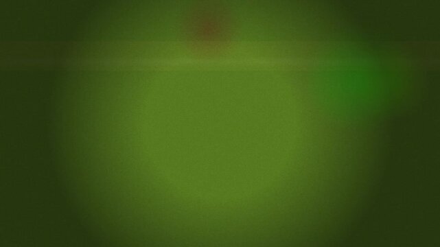 Soft green bokeh lights form an abstract natural background with warm circular highlights scattered throughout the frame.