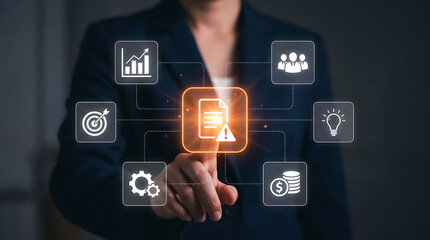 Obraz premium Businessman interacting with digital data risk and warning analytics interface