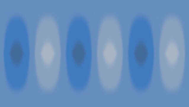 Blurry blue and white oval shapes.