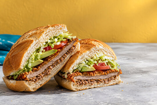 Mexican Torta de Milanesa Beef Cutlet Sandwich with Avocado