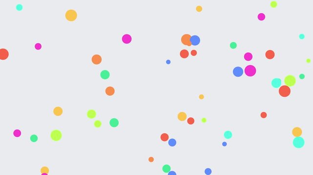 Scattered colorful dots on a white background