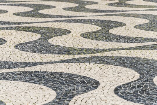 Wavy pattern in pavement, black and white, cobblestones, Rossio, Lisbon, Portugal
