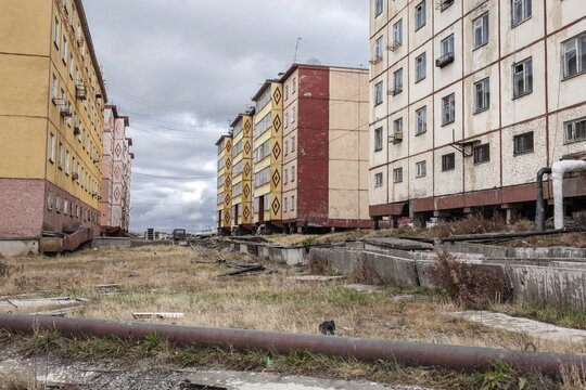 Damage caused by thawing permafrost in a housing estate, Chersky, Yakutia, Russia