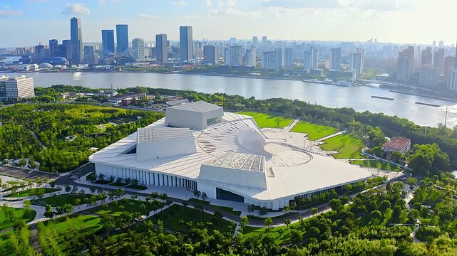 Aerial view of the Shanghai Grand Opera House in China against the backdrop of blue sky and white clouds