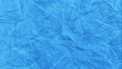 Obraz premium ​Crumpled light blue paper texture background full frame top view