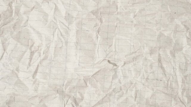 Crumpled grid paper texture stop motion background animation, artistic video transitions, educational graphics, scrapbooking visuals, and aesthetic collage projects.