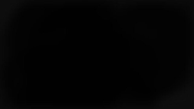 A solid black background representing complete darkness and total void space