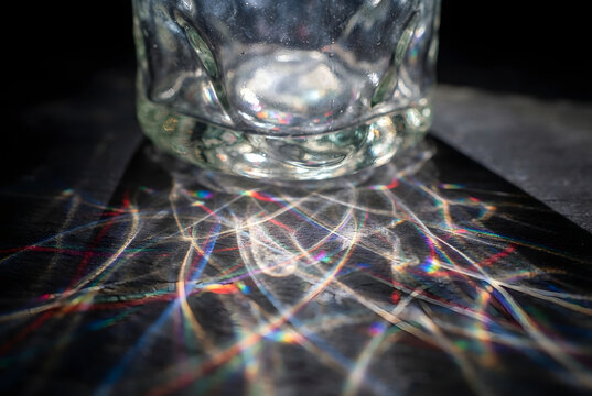 &bull;	Light refraction and caustic patterns through a clear glass bottle