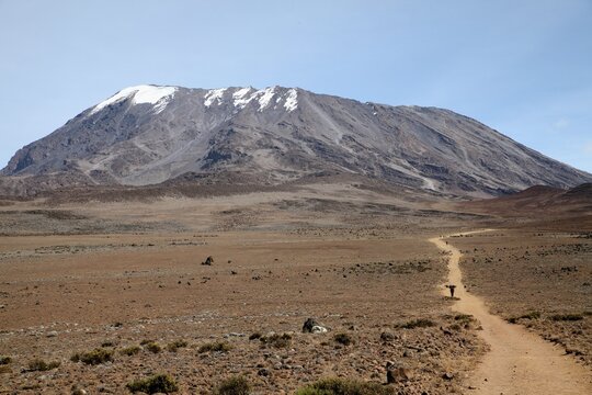 Hiker on the trail towards Kibo summit on Mount Kilimanjaro, Tanzania