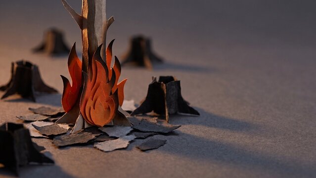 Conceptual paper art depicting forest fires and air pollution caused by burning trees and deforestation.