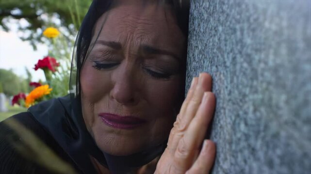 widow grieving close-up beside gravestone, hand pressed to cold stone for inheritance drama, probate dispute, funeral secrecy, suspicious loss, estate conflict, and dark family advertising