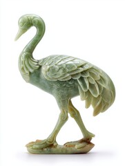 Fototapeta premium Elegant Green Jade Crane Statue Carving Standing On A Minimalist White Background Studio Lighting