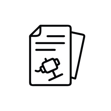 Technical documentation papers with machine component diagram shows industrial blueprint and engineering plans.