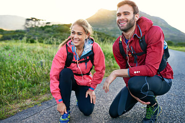 Fototapeta premium Exercise, road and thinking with couple in nature together for activity, bonding or cardio training. Fitness, relationship and vision with happy people outdoor on mountain path for start of workout